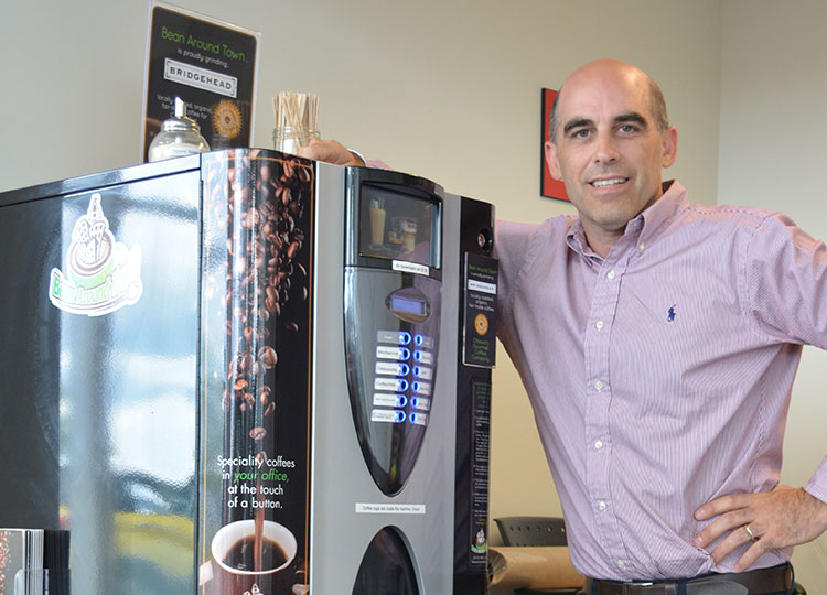 Ed Hemphill with a JBC series coffee machine - as part of the Office Coffee service of Bean Around Town.