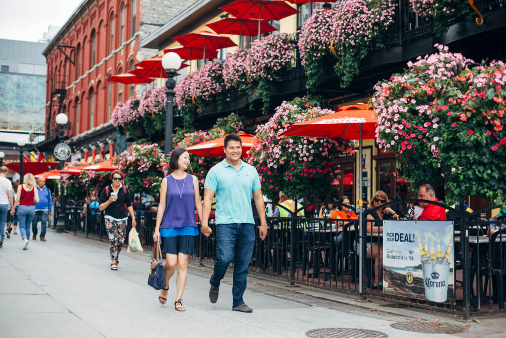 A couple walking through the Byward Market in Ottawa