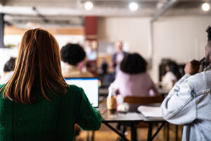 Students sitting in a classroom. 