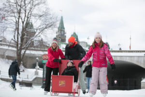 A family out for a skate on the Rideau Canal Skateway in Ottawa