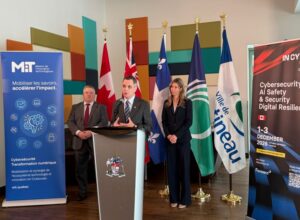 Ottawa Mayor Mark Sutcliffe and Gatineau Mayor Maude Marquis-Bissonnette and INCYBER Director General Daniel Blanc gather at an event podium for a joint announcement. Photo Source: LinkedIn: https://www.linkedin.com/in/mark-sutcliffe/
