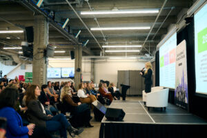 Invest Ottawa President and CEO Sonya Shorey addresses the crowd at the IWM kickoff event: F Factor. 