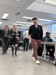Anvil Co-founder Samuel Witherspoon walks Mayor Marc Sutcliffe and Invest Ottawa CEO and President Sonya Shorey through Anvil's offices in Ottawa