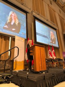 Invest Ottawa President and CEO Sonya Shorey on stage at Elevate International. 