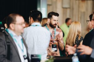Business leaders networking in attendance of the AccelerateOTT conference. 
