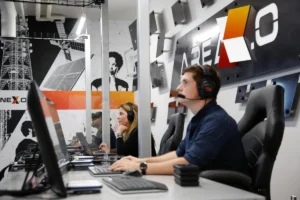 An image from inside the command centre at Area X.O with operators wearing headsets.