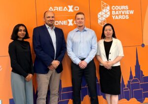 A group photo, featuring a representative from Kelluu and Invest Ottawa team members. 