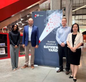 hoto, featuring a representative from Kelluu and Invest Ottawa team members